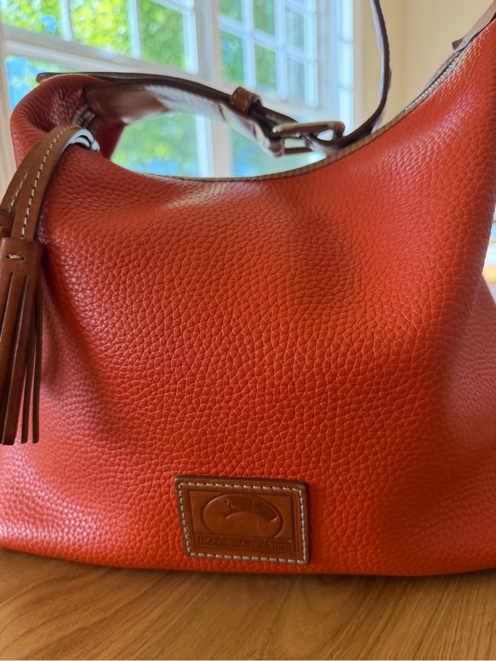Dooney & Bourke orange Leather Tassel Shoulder Bag in excellent condition